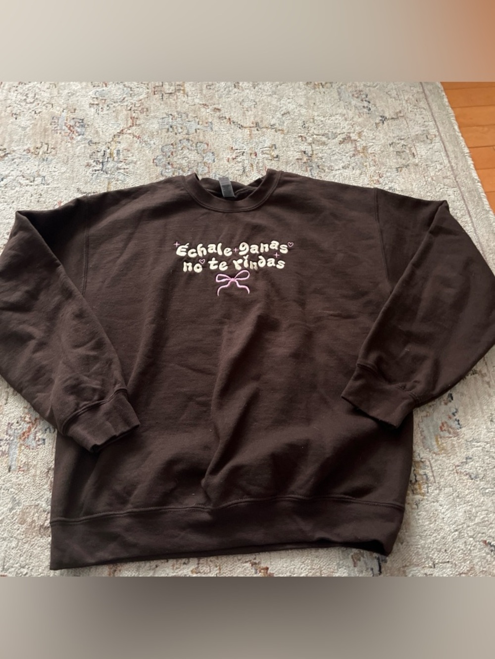 Brown Crewneck Sweatshirt with Pink Spanish Script